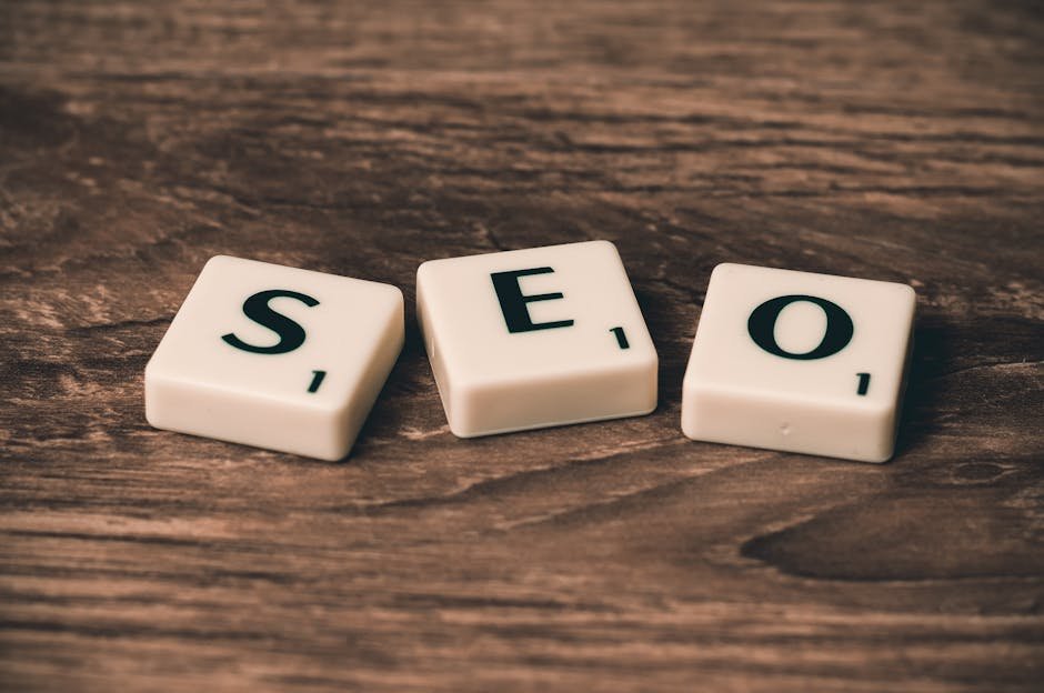 Scrabble tiles spelling SEO on a wooden surface.